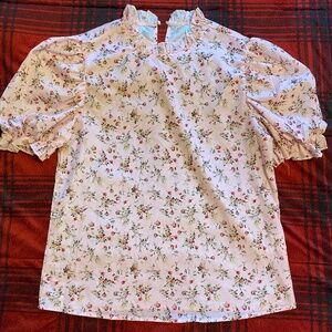 light pink floral blouse